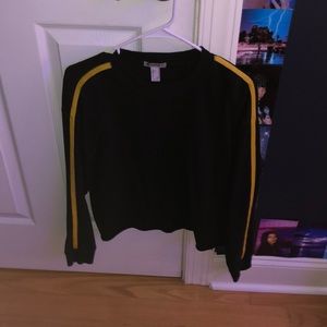 crew neck sweater with one yellow strip on side of arm